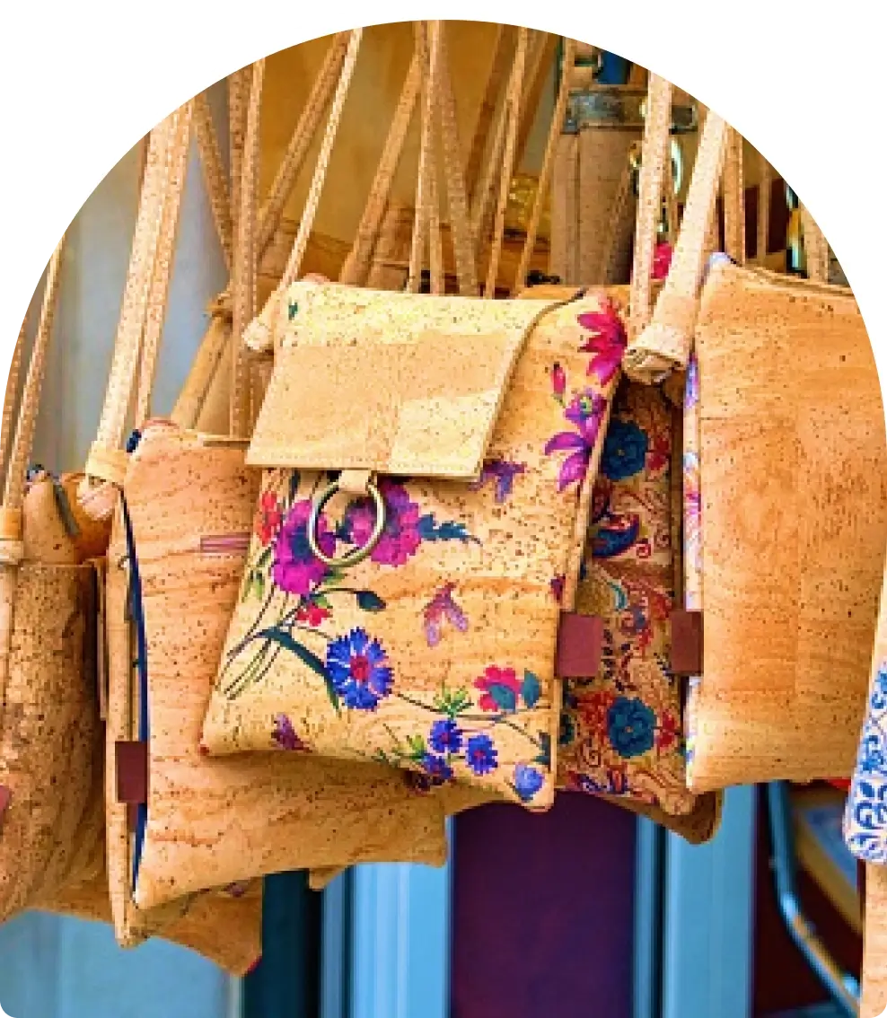 Floral cork crossbody bags hanging.