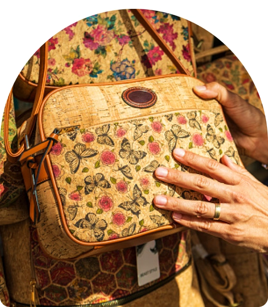 Cork crossbody bag with butterfly print.