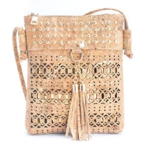 Beige handbag with tassels and studs.
