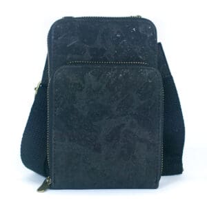 Black textured crossbody bag with zippers.