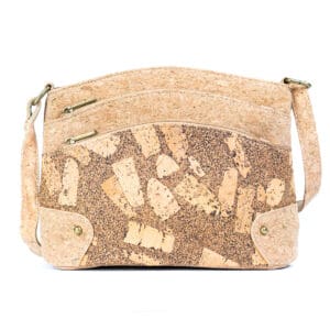 Beige cork handbag with abstract pattern.