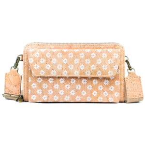 Floral-patterned cork handbag with strap.