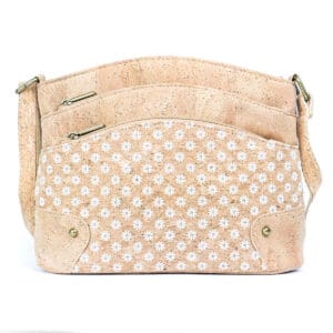 Beige floral-patterned handbag with zippers.