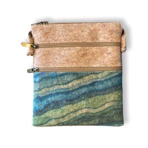 Cork and fabric crossbody bag with zippers.