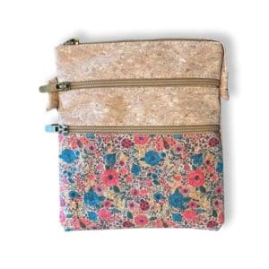 Floral-patterned two-tone pouch with zippers.
