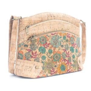 Floral-patterned cork handbag with multiple pockets.