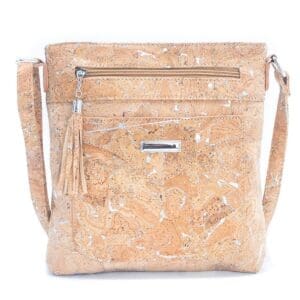 Cork crossbody bag with tassel detail.