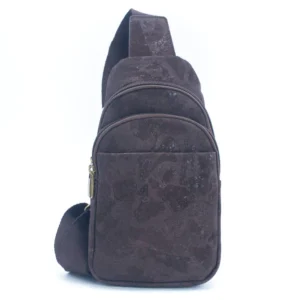 Brown sling bag with multiple zippered compartments.
