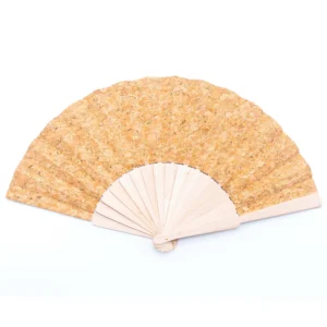Cork hand fan on white background.