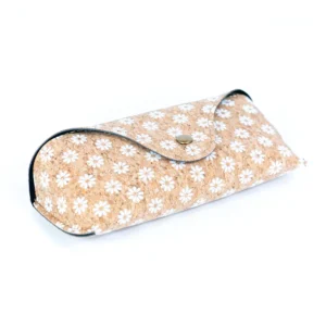 Floral-patterned eyeglass case with button closure.