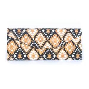 Geometric patterned clutch with tribal design.